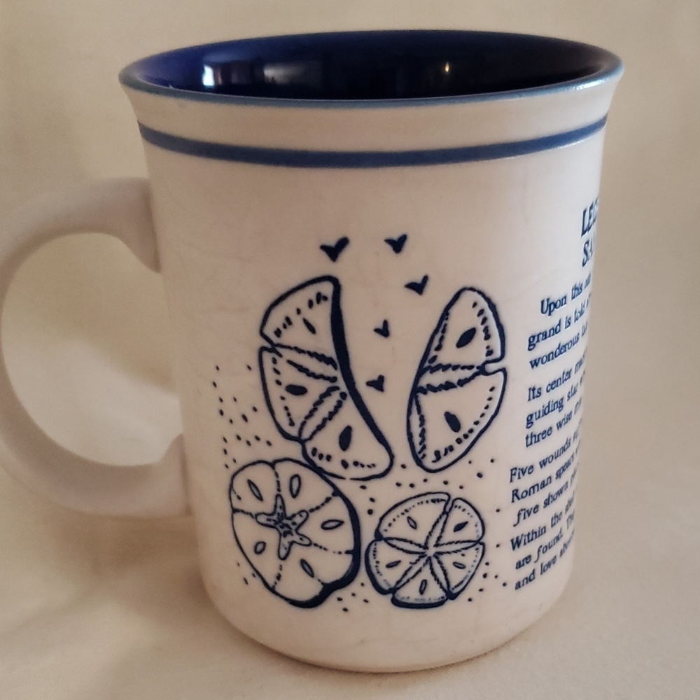 Ledgend of the Sand dollar coffee cup.